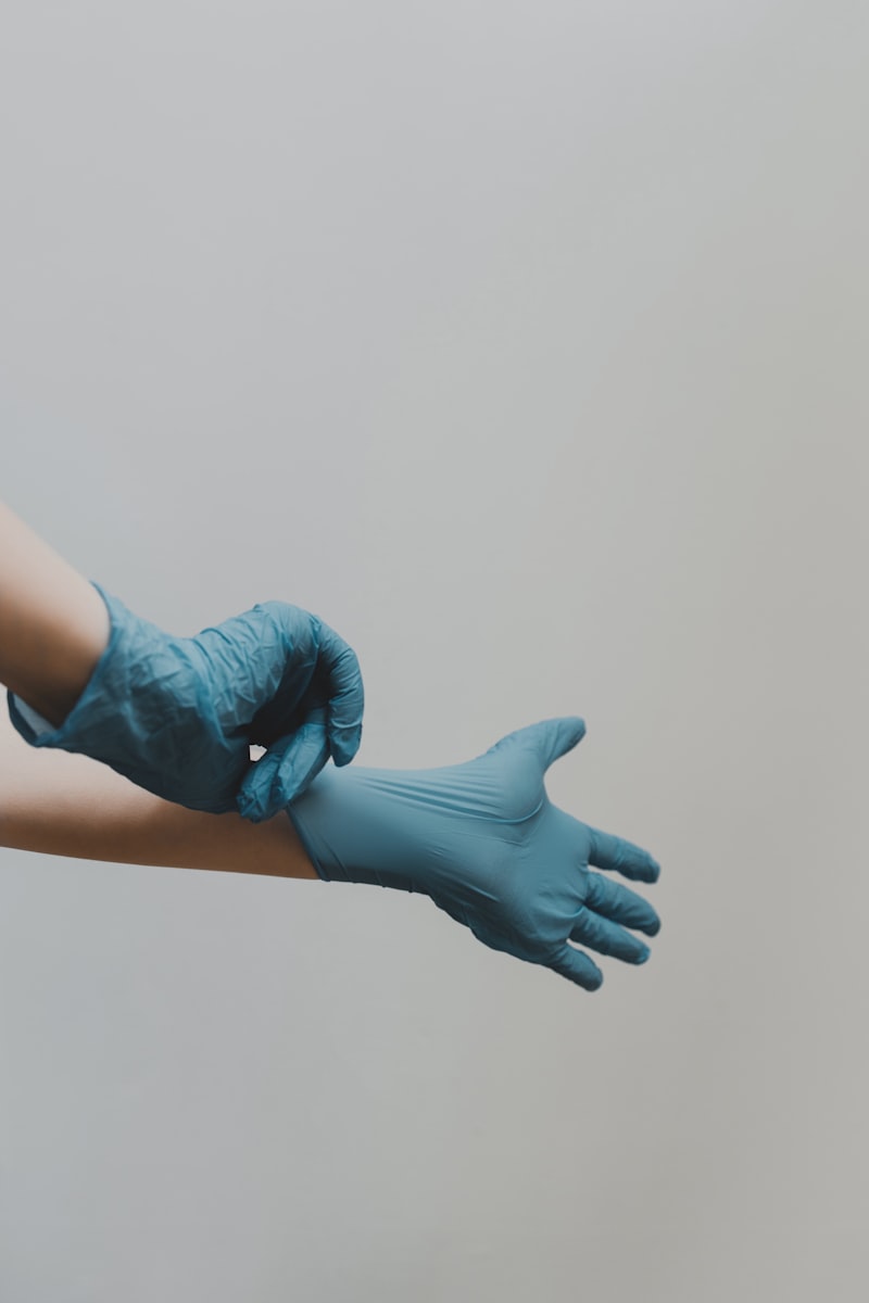 Laundry worker handling clothing carefully - dedicated fabric care